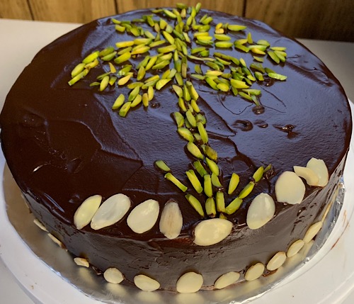Vanilla cake with chocolate glaze